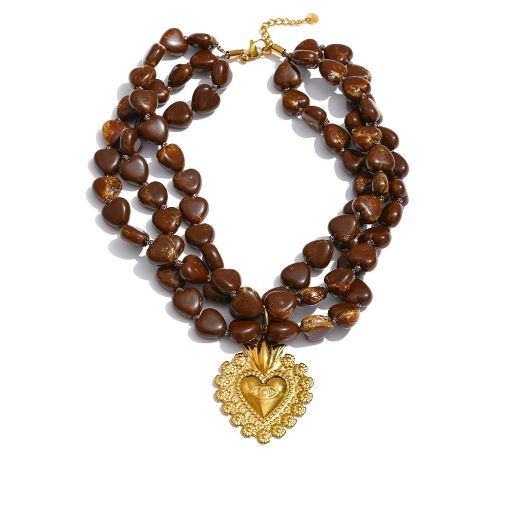Gold-plated layered acrylic bead necklace with a heart pendant