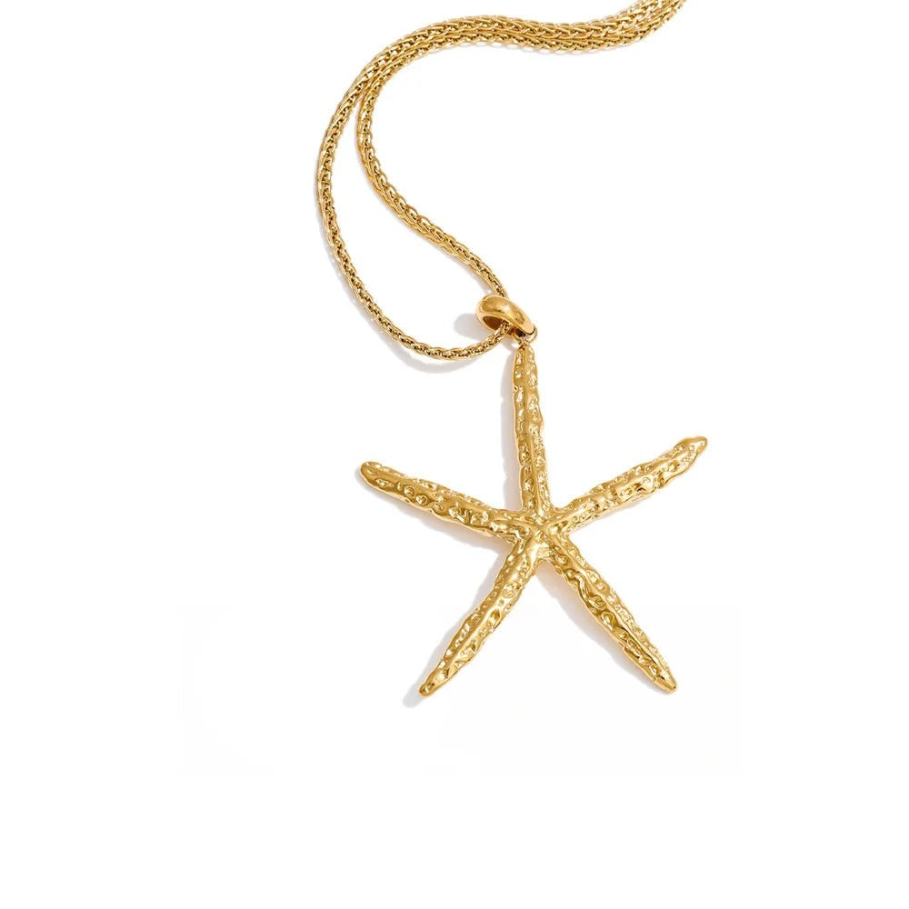 Gold-plated star pendant necklace at collarbone length