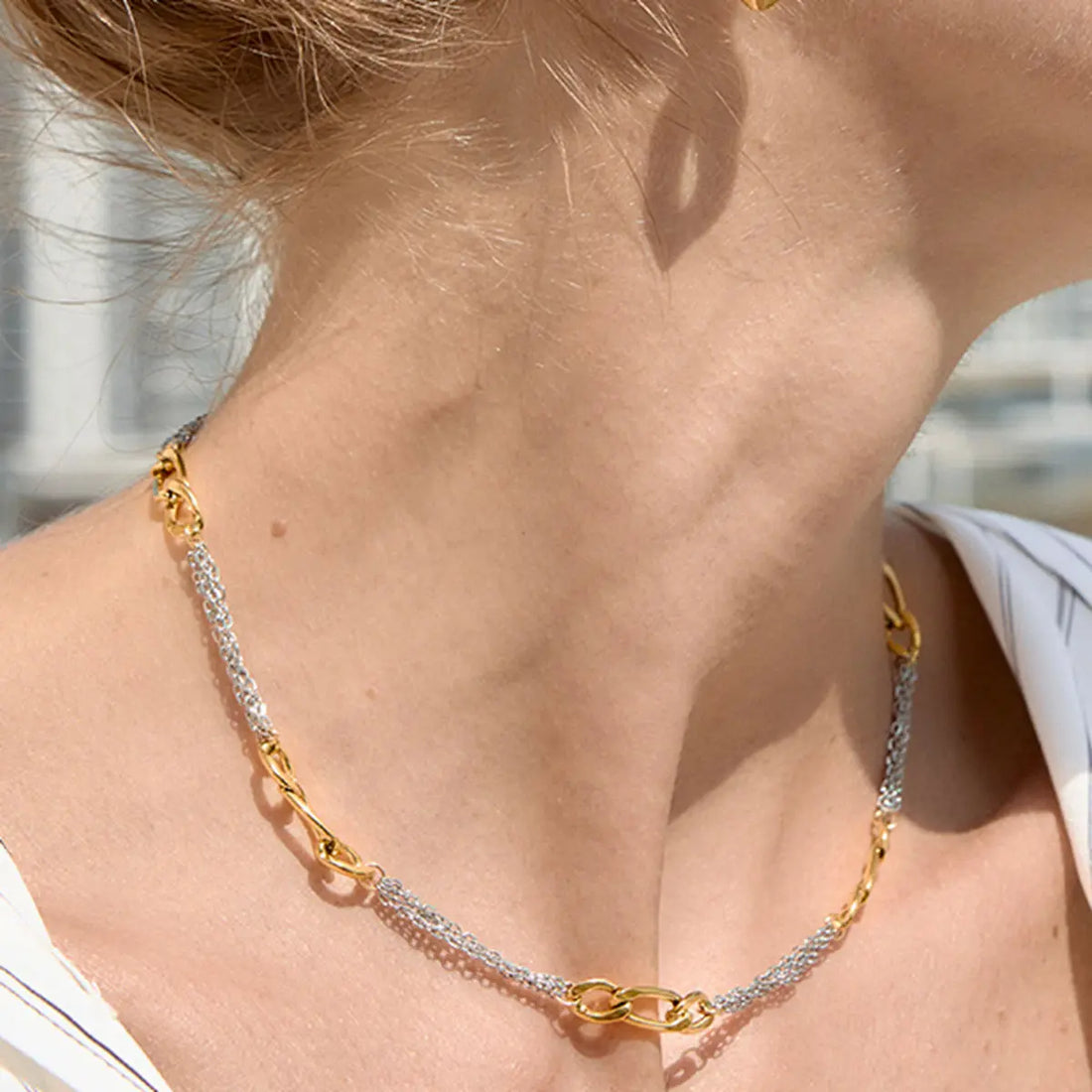 Two-tone figaro chain necklace worn as a simple, office-ready focal piece