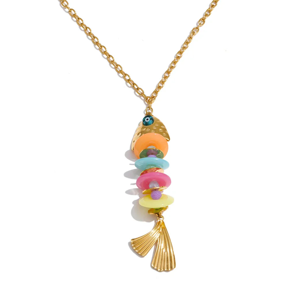Gold-plated stainless steel necklace with a colorful resin fish pendant, kept clean with a simple soap-and-water routine