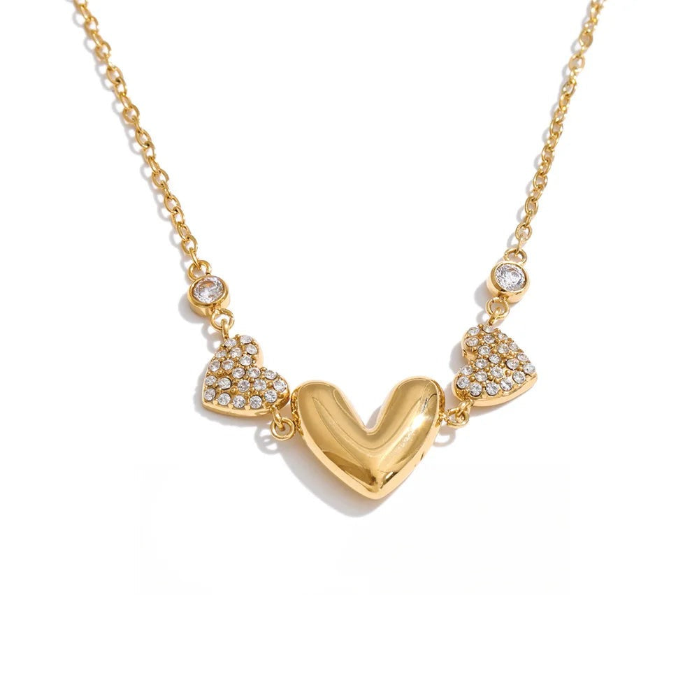 Gold-plated stainless steel necklace with cubic zirconia hearts.