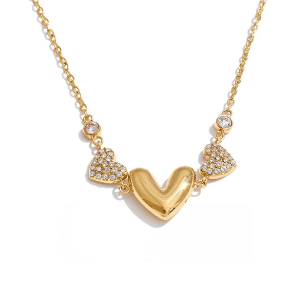 Gold-plated stainless steel necklace with cubic zirconia hearts.