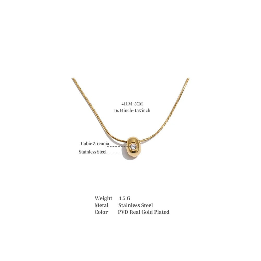Cubic zirconia geometric necklace in gold-plated stainless steel with cubic zirconia.