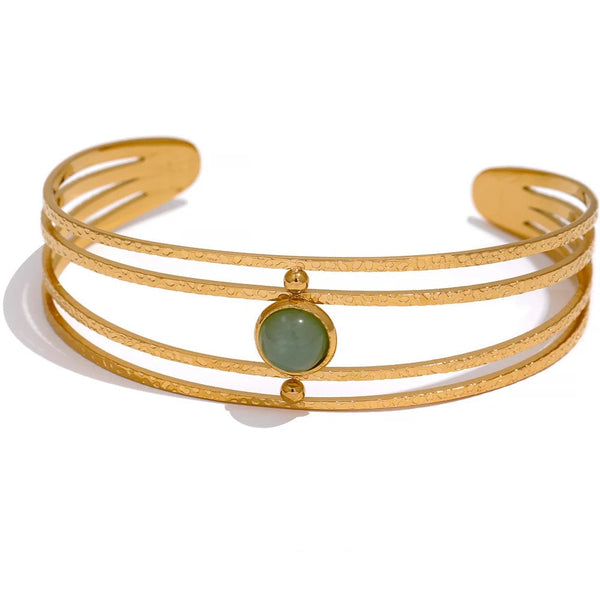 Gold-plated bracelet with natural stone accents.