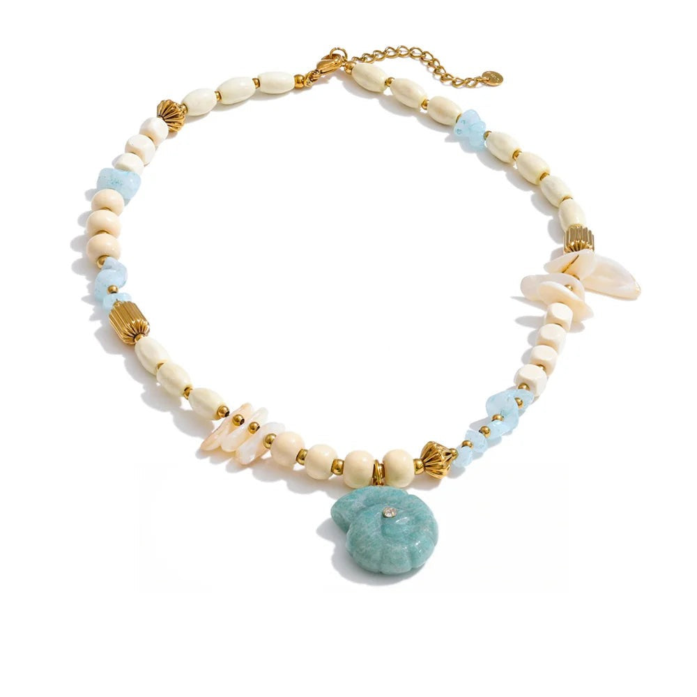 Gold-plated necklace with blue stone and shell.