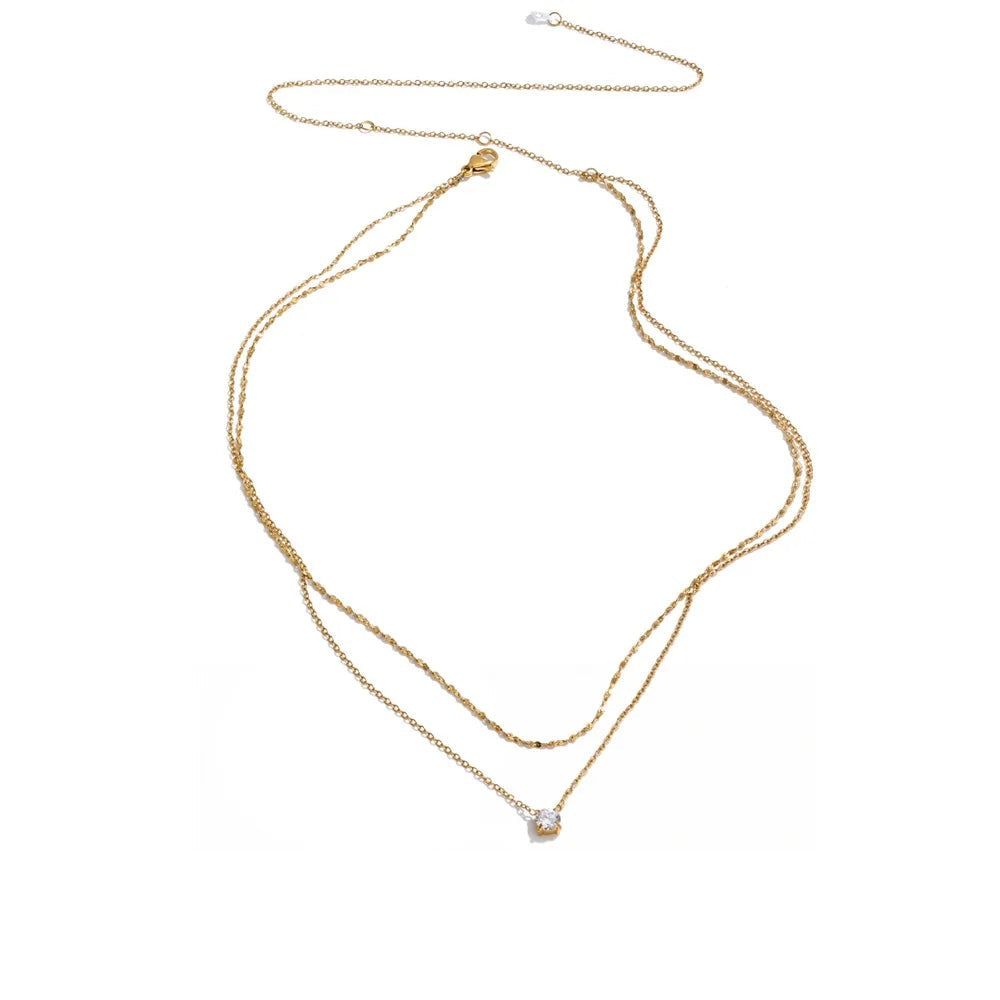 Gold-plated stainless steel necklace with cubic zirconia stones.