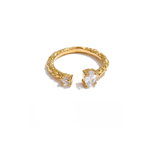 Gold-plated stainless steel ring with cubic zirconia.