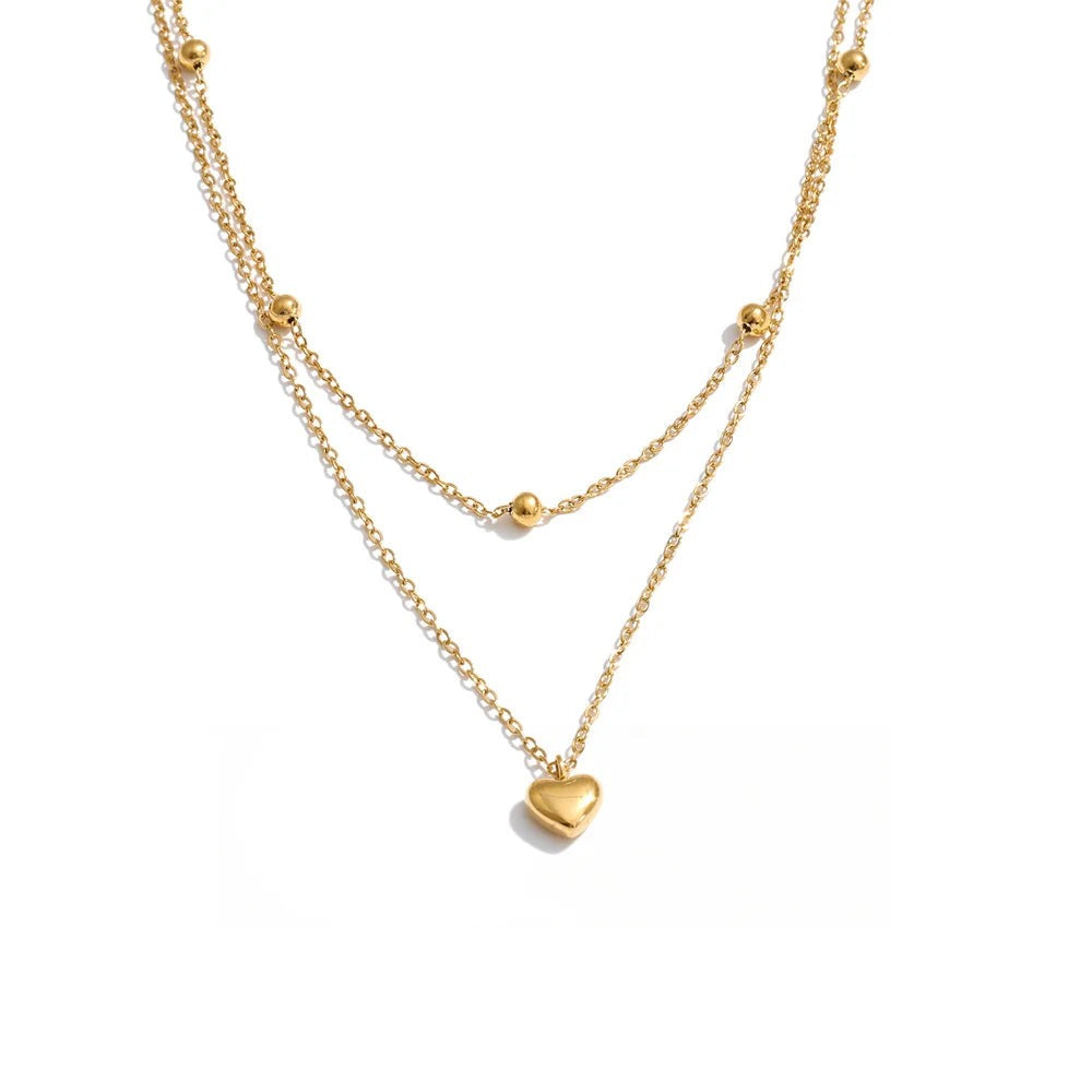Gold-plated stainless steel necklace with a heart pendant.