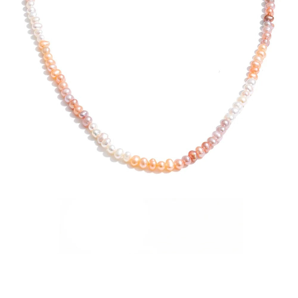 Freshwater pearl necklace with gold-plated stainless steel beads.