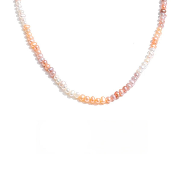Freshwater pearl necklace with gold-plated stainless steel beads.