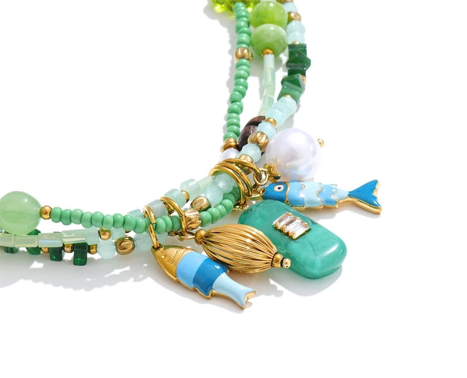 Pearl crystal geometric necklace in gold-plated stainless steel with pearl and crystal.