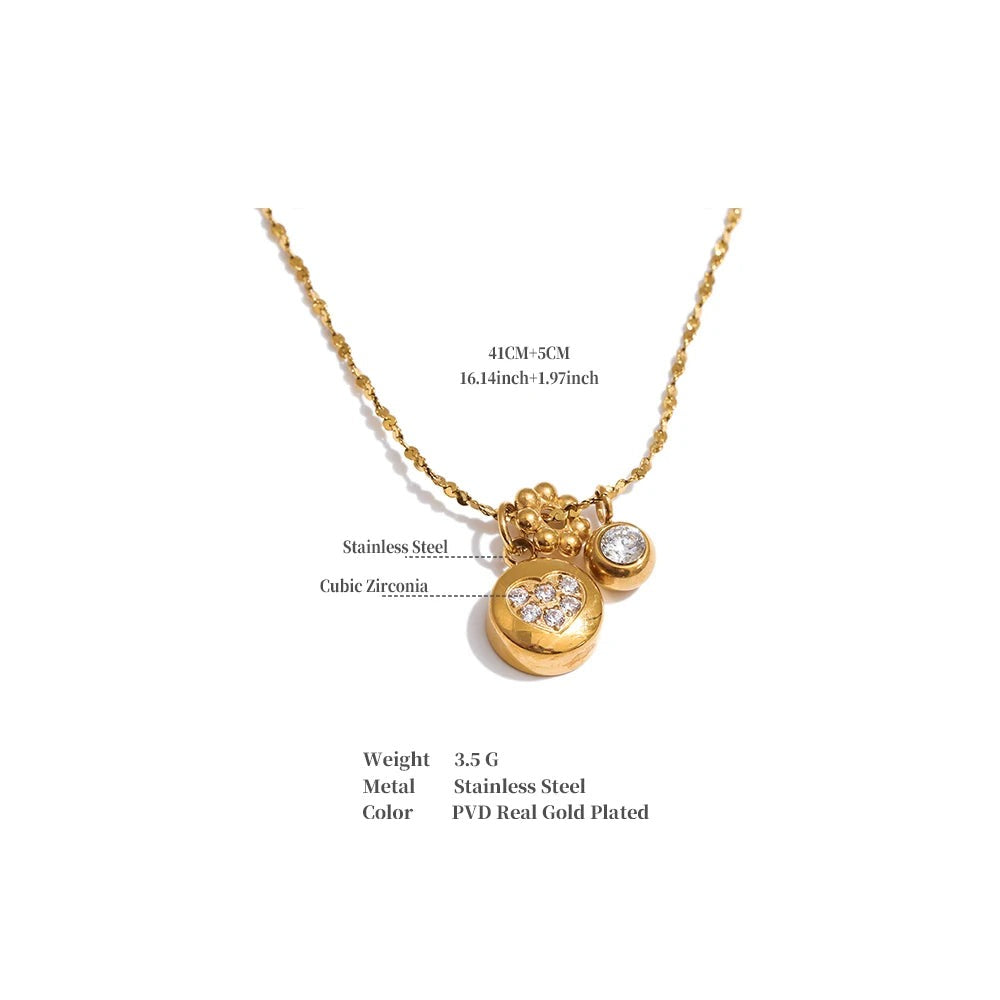 Cubic zirconia heart geometric necklace in gold-plated stainless steel with cubic zirconia.