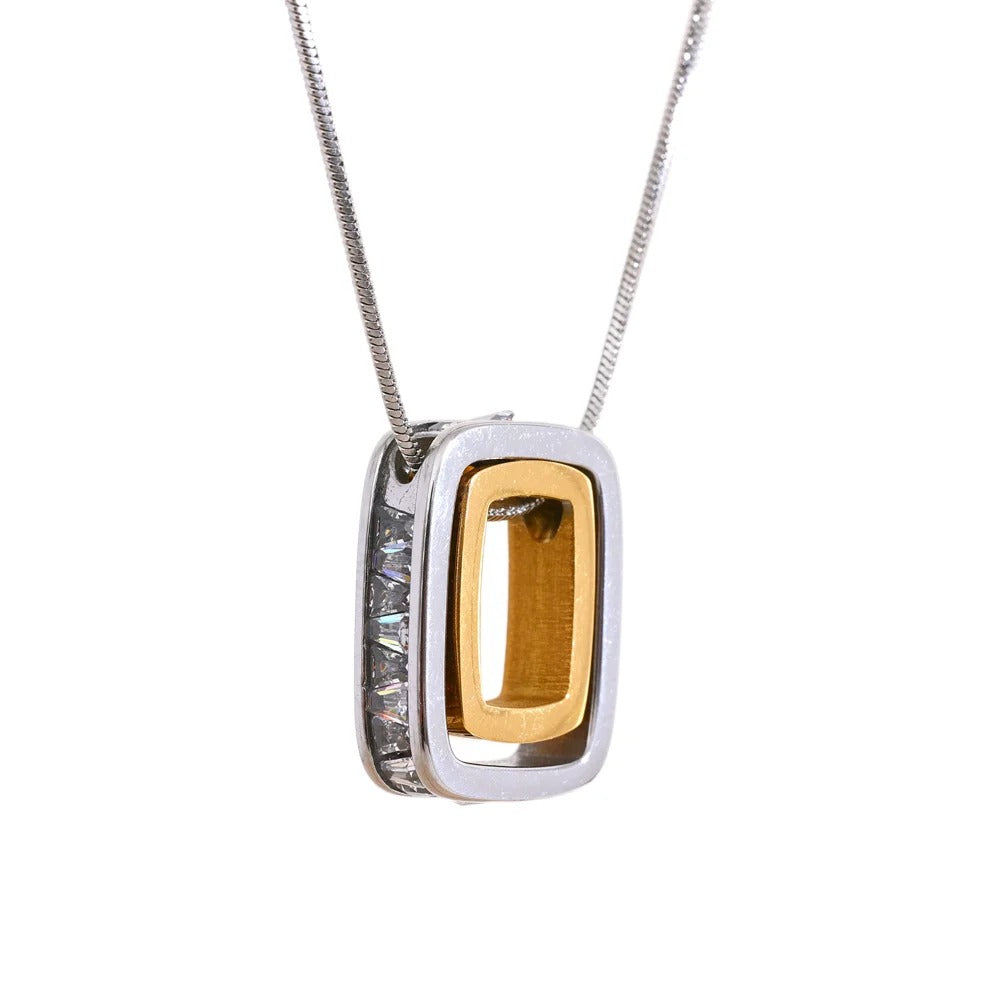 Gold-plated stainless steel necklace with a large rectangular yellow gemstone pendant featuring a diamond-like pattern around the edges.
