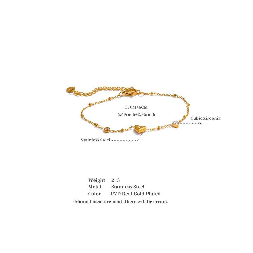 Cubic zirconia heart chain necklace in gold-plated stainless steel with cubic zirconia.