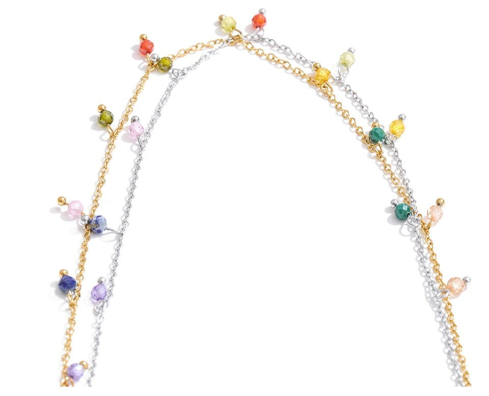 Cubic zirconia multi-color geometric necklace in gold-plated stainless steel with cubic zirconia.