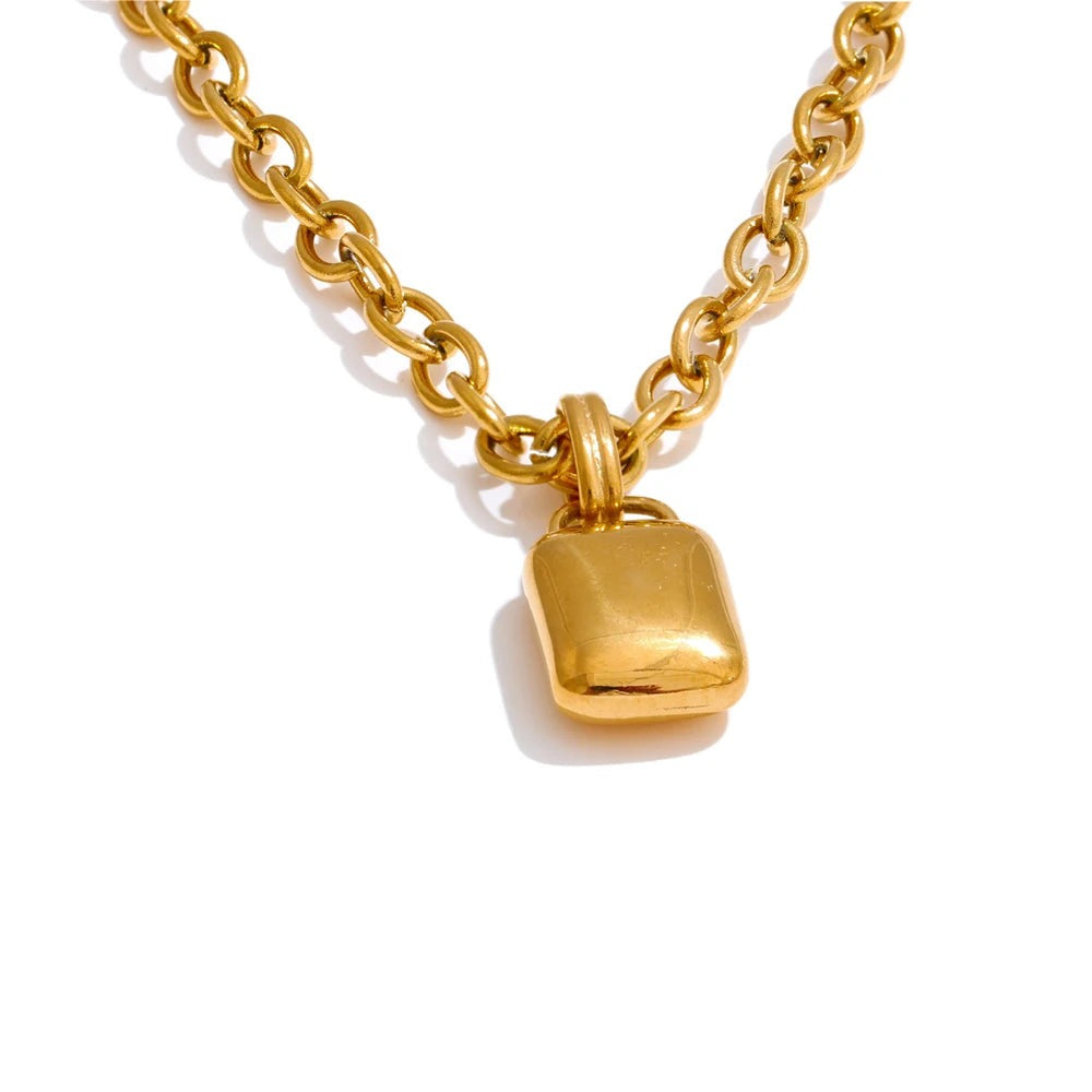 Gold-plated stainless steel necklace with a small pendant.