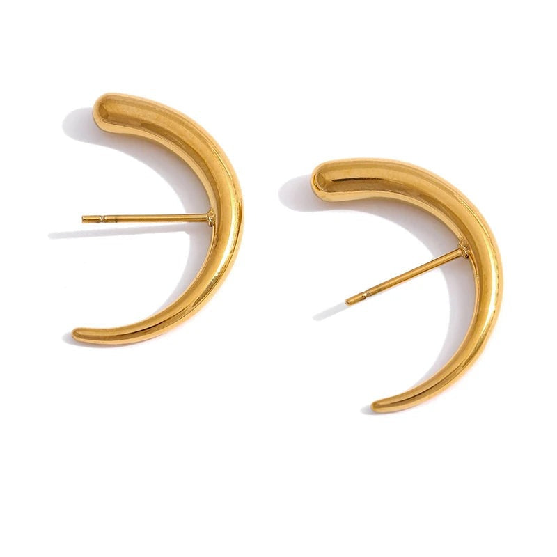 Gold-plated stainless steel earrings with a large hoop design.