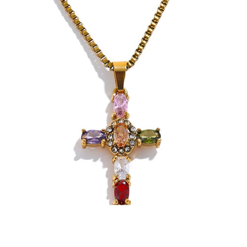 Gold-plated cross necklace with cubic zirconia stones.