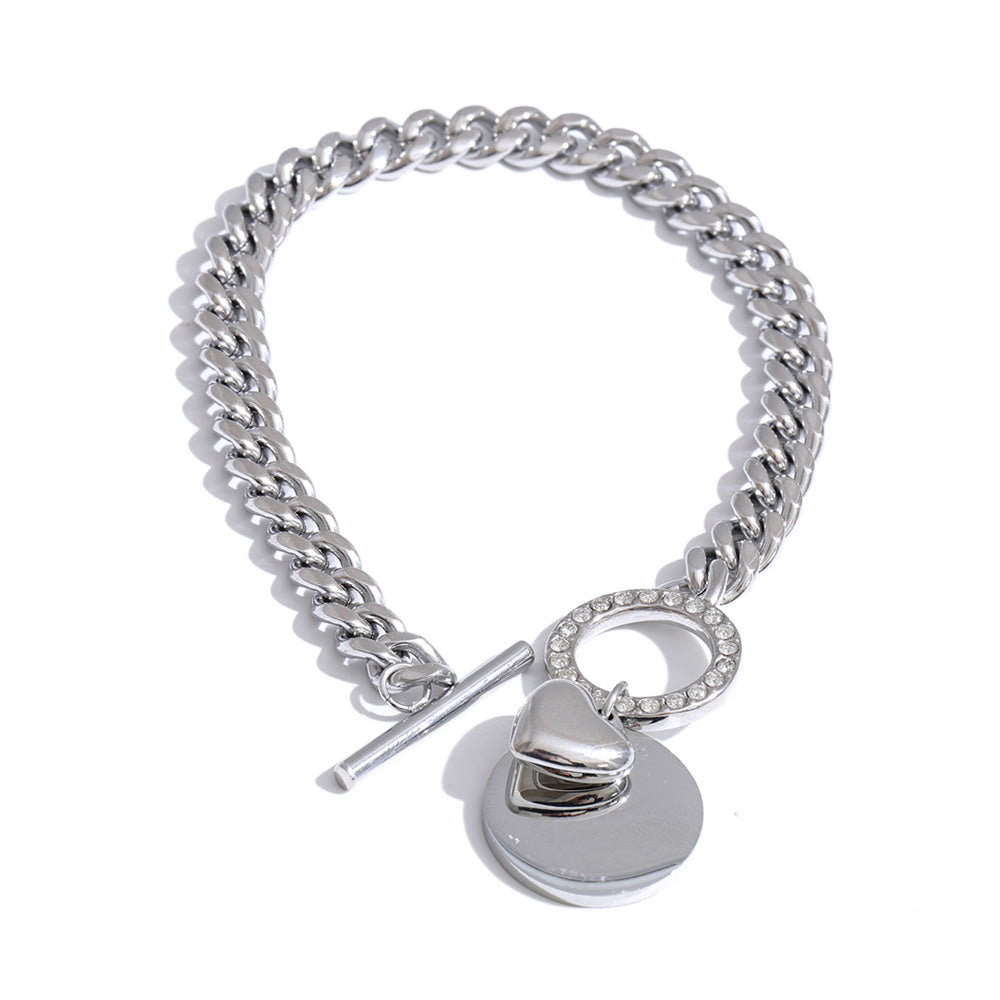 Geometric chain necklace in gold-plated stainless steel.