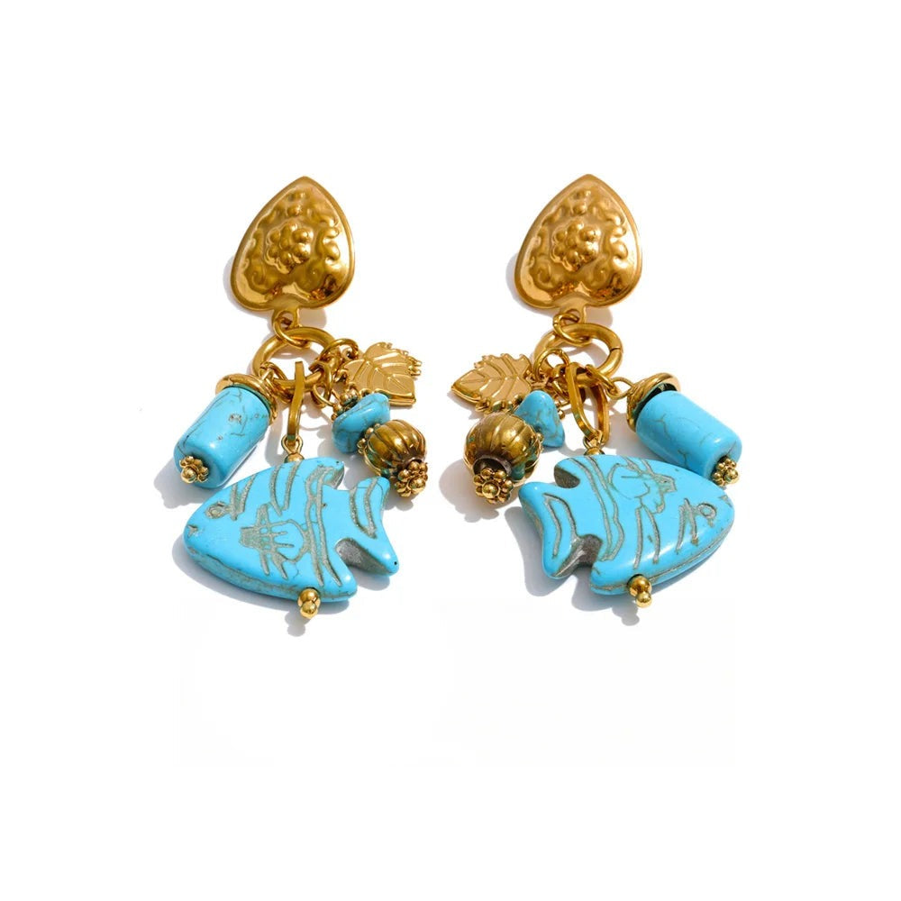 Gold-plated stainless steel earrings with blue stones and a fish design.