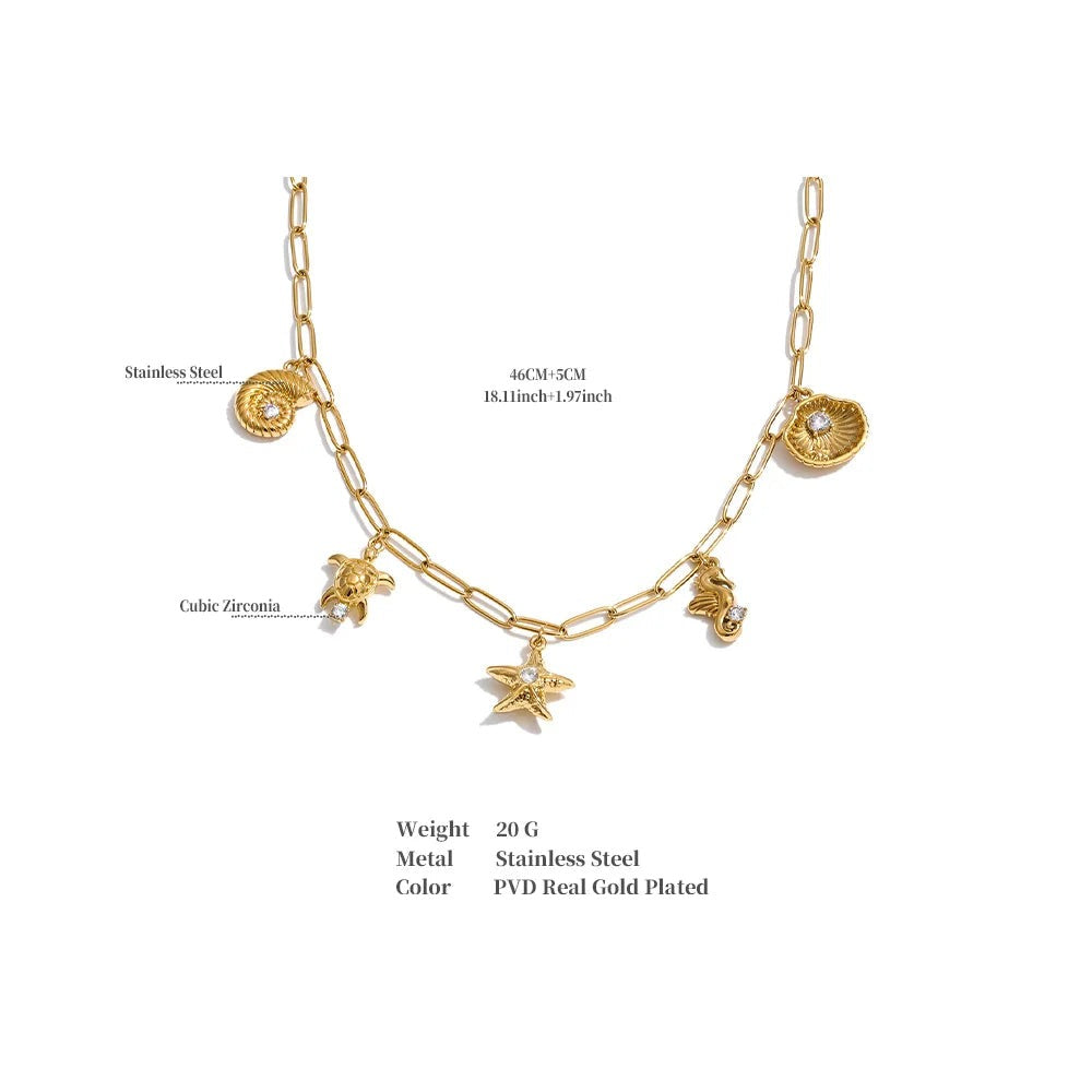 Cubic zirconia shell star necklace in gold-plated stainless steel with cubic zirconia and shell.