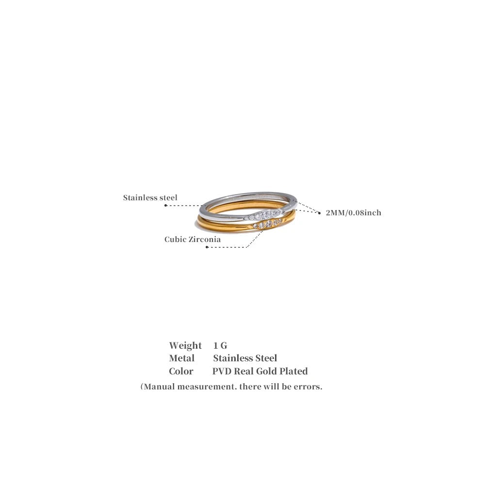 Cubic zirconia geometric ring in 18K gold-plated stainless steel with cubic zirconia.