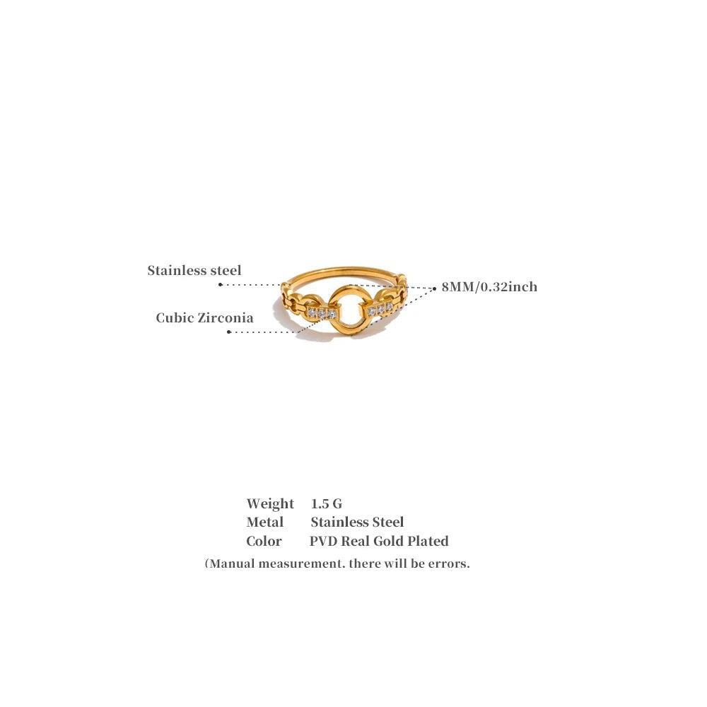 Cubic zirconia geometric ring in gold-plated stainless steel with cubic zirconia.
