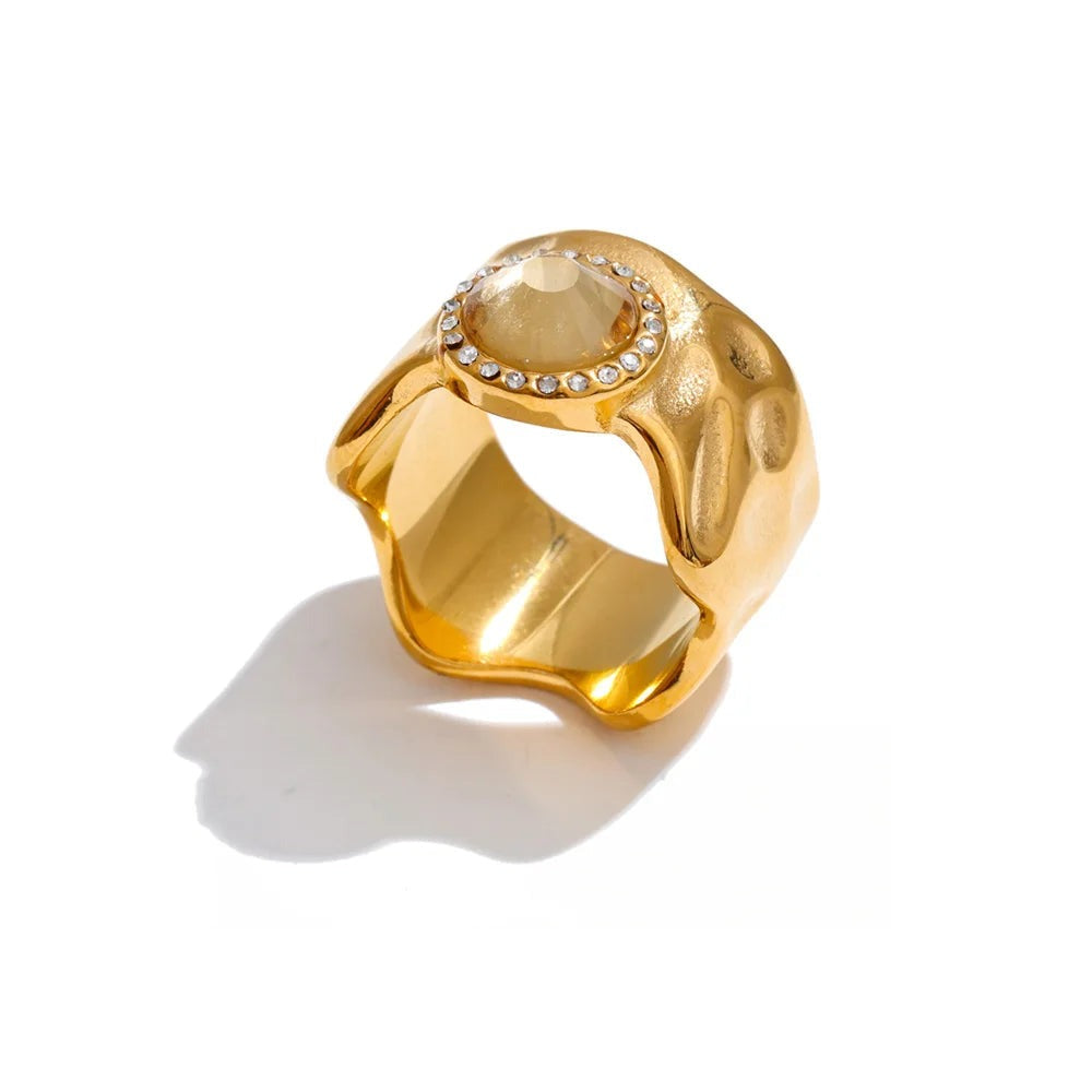 Gold-plated ring with cubic zirconia.