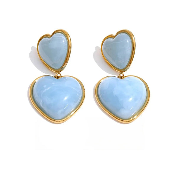 Gold-plated stainless steel earrings with blue resin hearts.