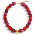 Acrylic beaded geometric necklace in gold-plated stainless steel with acrylic.