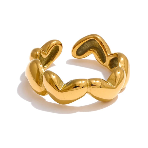 Gold-plated stainless steel ring featuring a heart shape on one side.