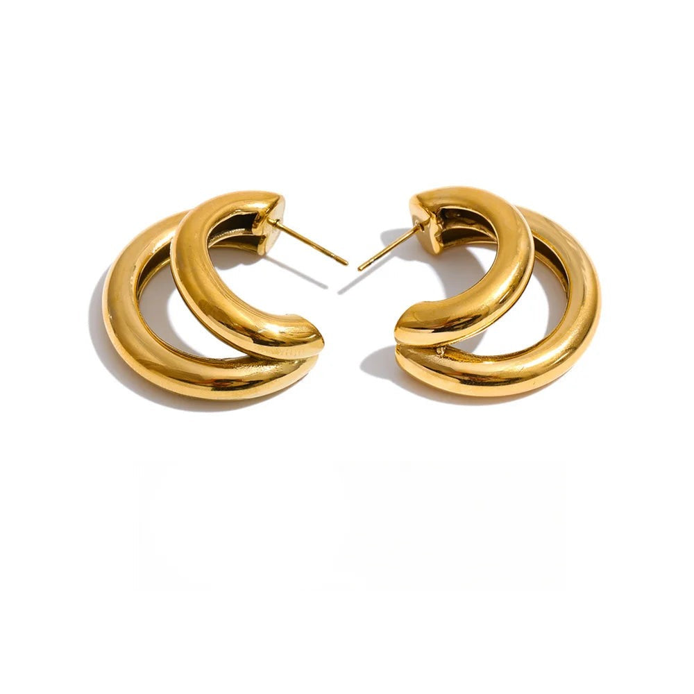 Gold-plated stainless steel earrings with a large hoop design.