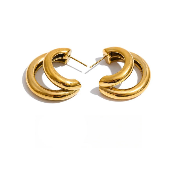 Gold-plated stainless steel earrings with a large hoop design.