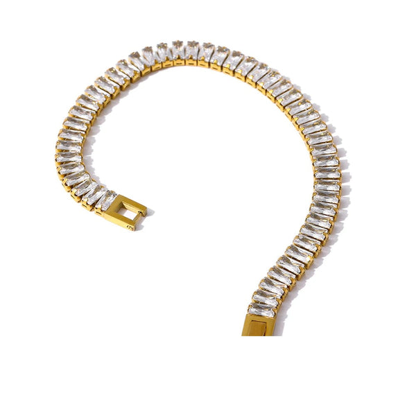 Cubic zirconia geometric bracelet in gold-plated stainless steel with cubic zirconia.