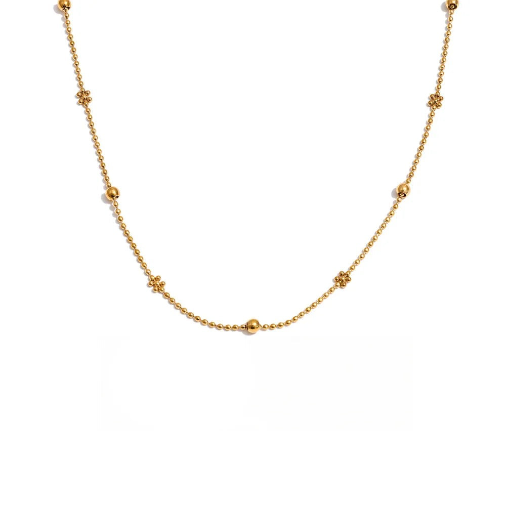 Gold-plated stainless steel necklace featuring a large bead with multiple smaller beads.