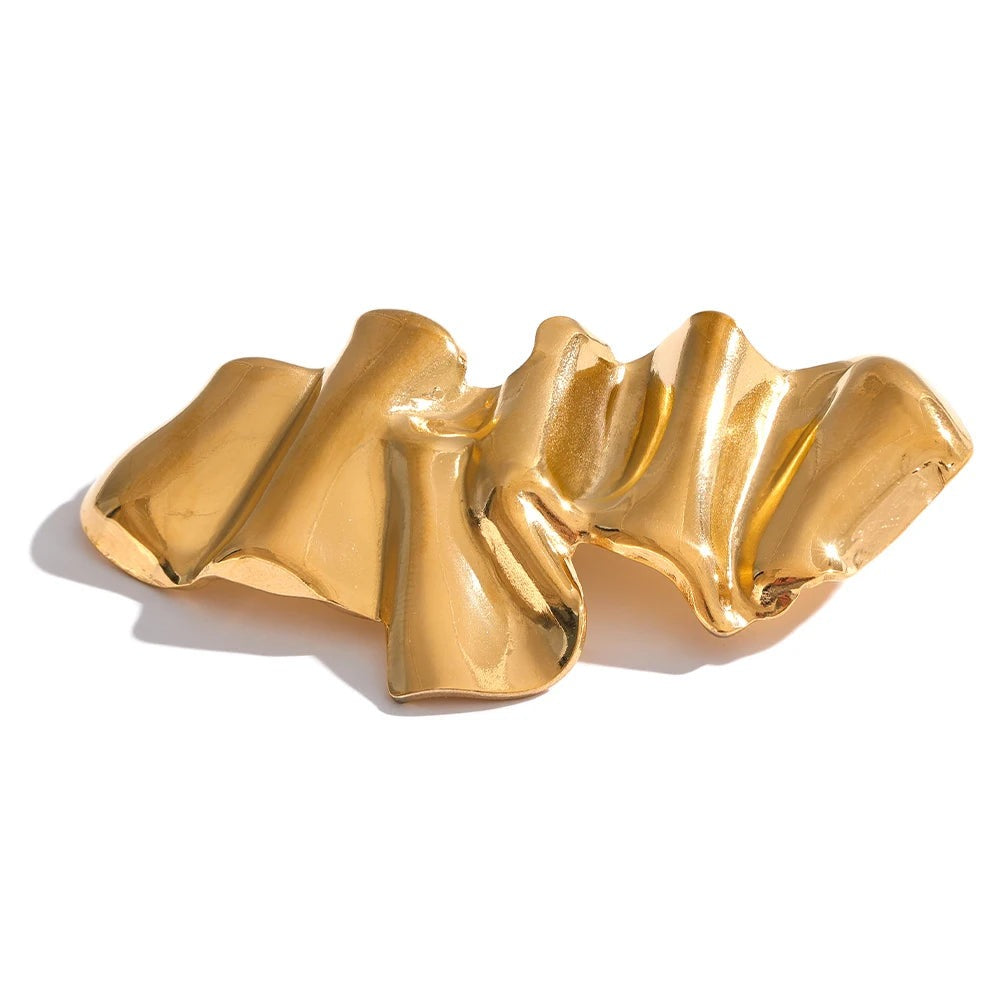 Gold-plated stainless steel brooches with abstract design.
