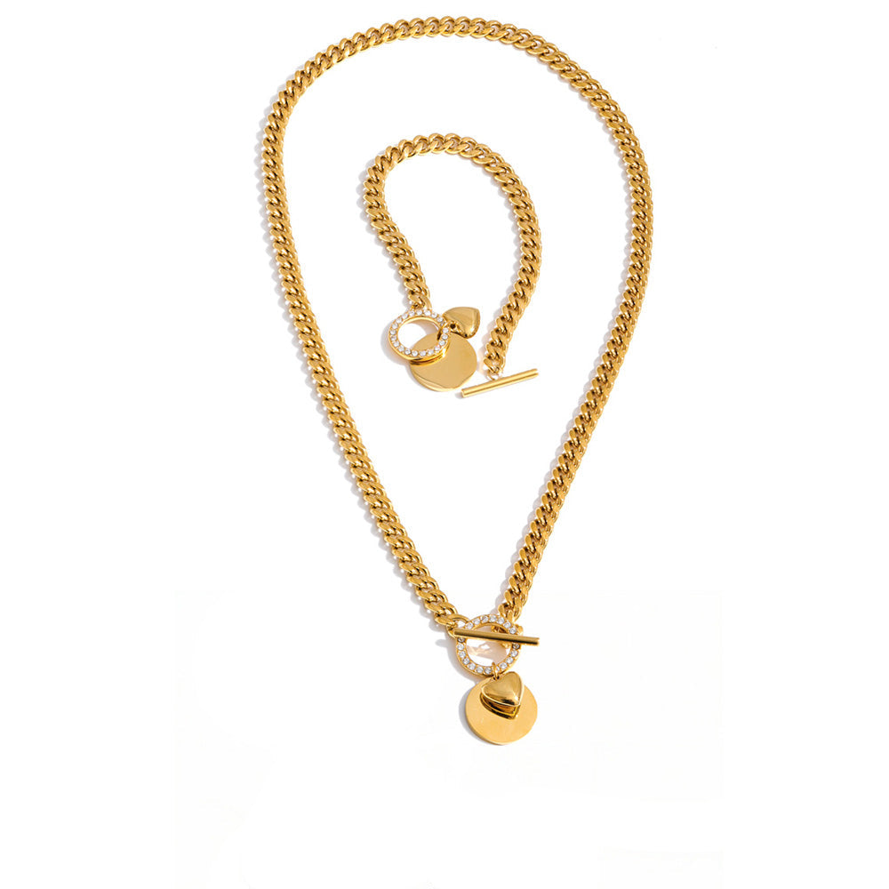 Gold-plated stainless steel necklace with a pendant featuring a keyhole design.