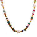 Gold-plated stainless steel necklace with freshwater pearls and natural stones.