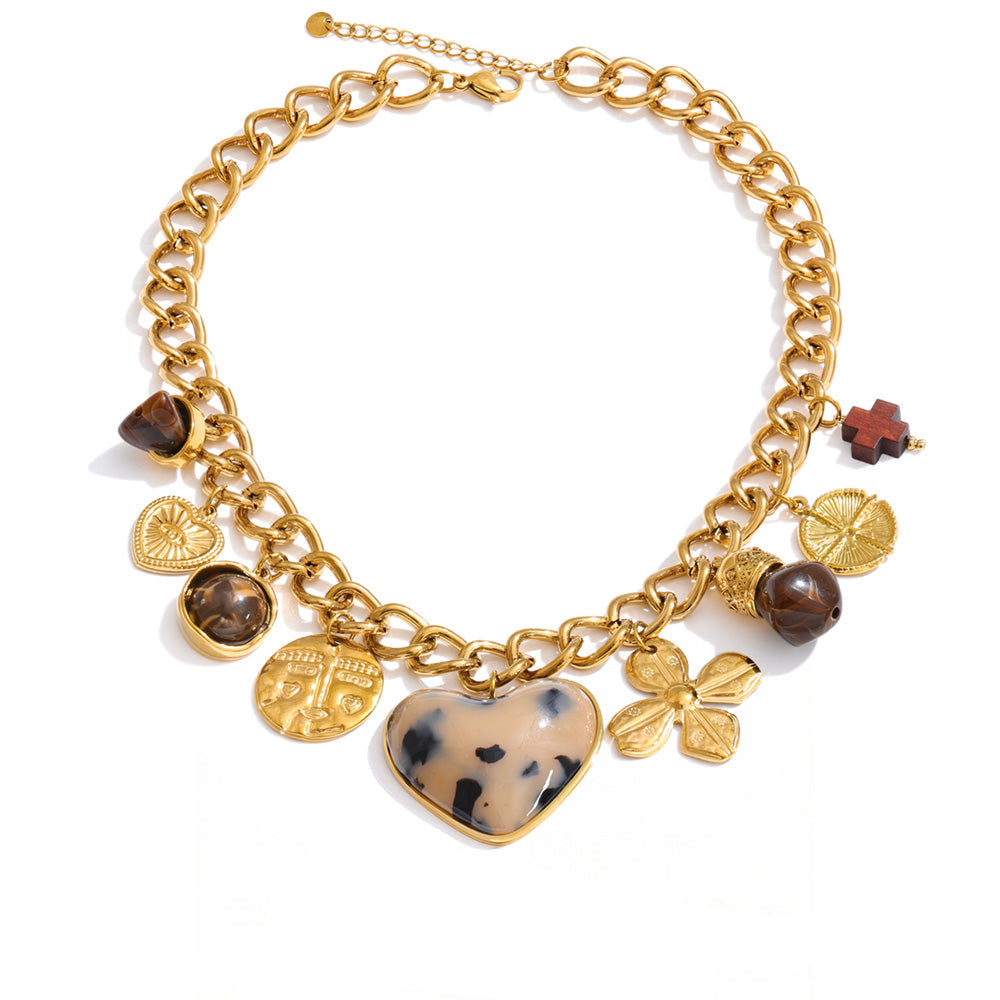 Gold-plated stainless steel necklace with resin, featuring a large heart pendant and various other pendants.