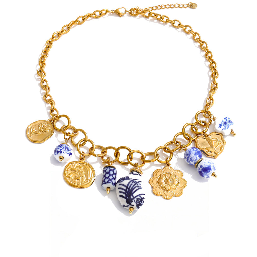 Gold-plated stainless steel necklace with blue and white beads.