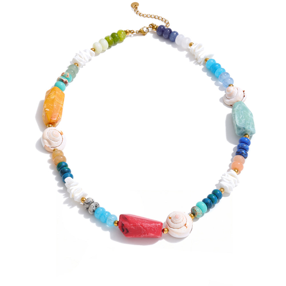 Gold-plated necklace with natural stones and shells.