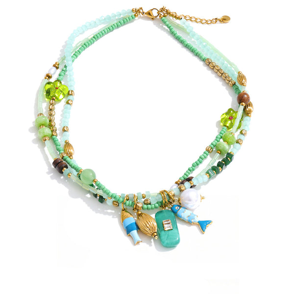 Gold-plated stainless steel necklace with pearl and crystal beads.