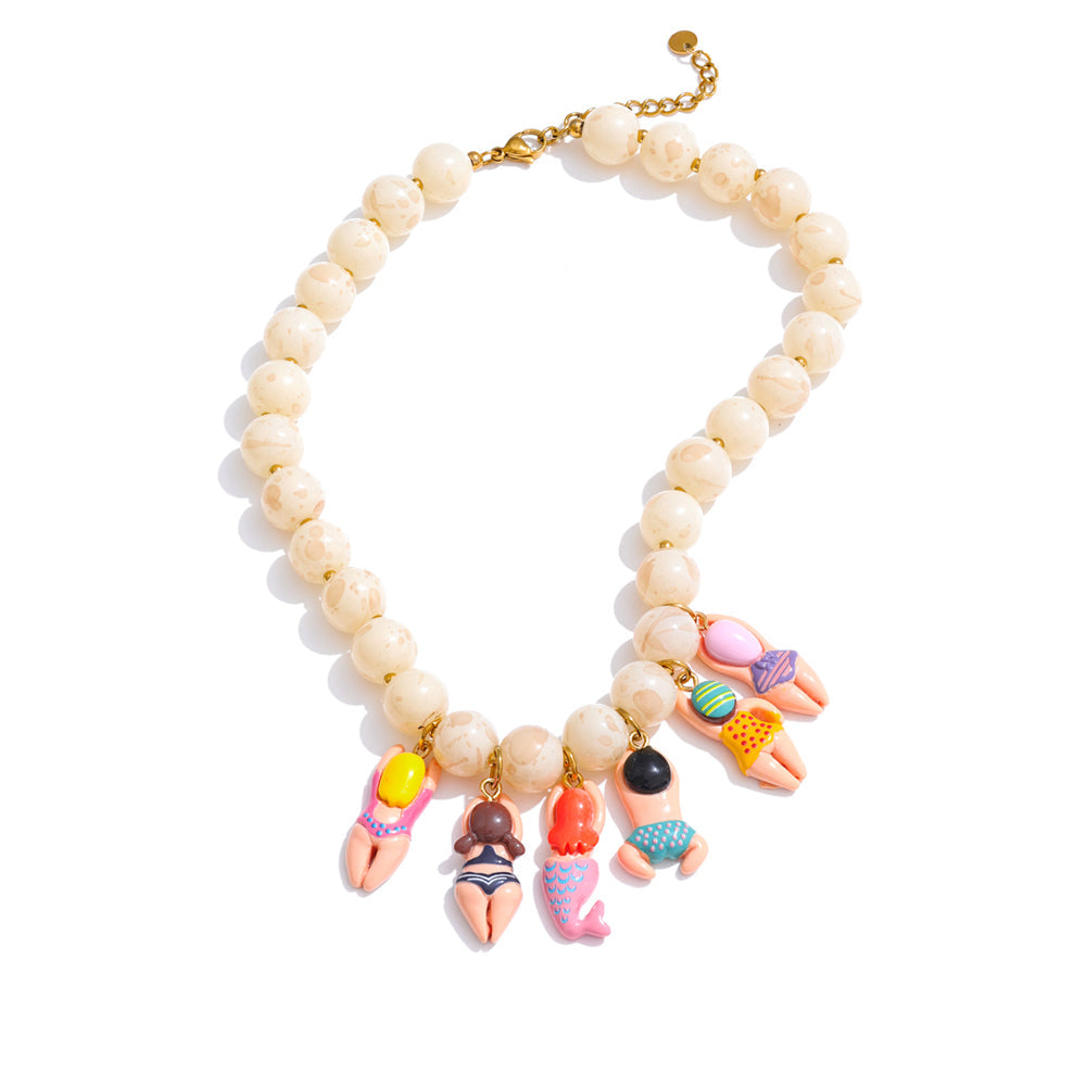 Gold-plated necklace with natural stone beads and resin charms.
