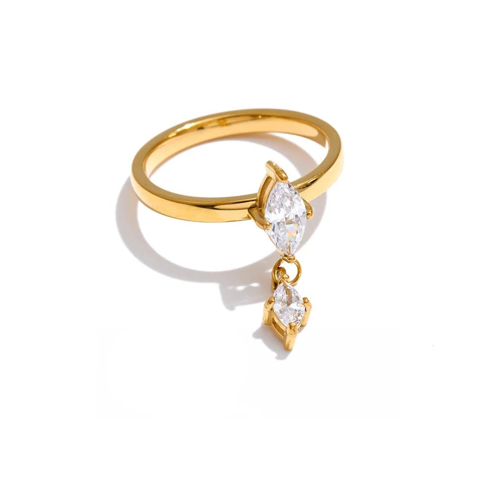 Gold-plated ring with cubic zirconia stones.