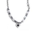 Gold-plated stainless steel necklace with pearl and a heart charm.