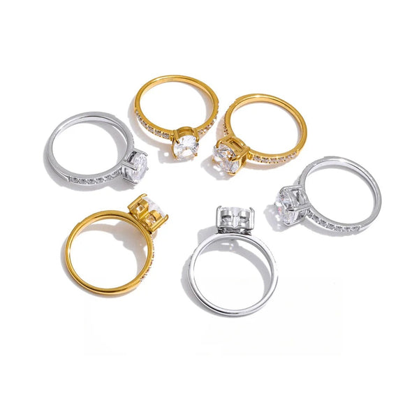 Gold-plated stainless steel ring with cubic zirconia.