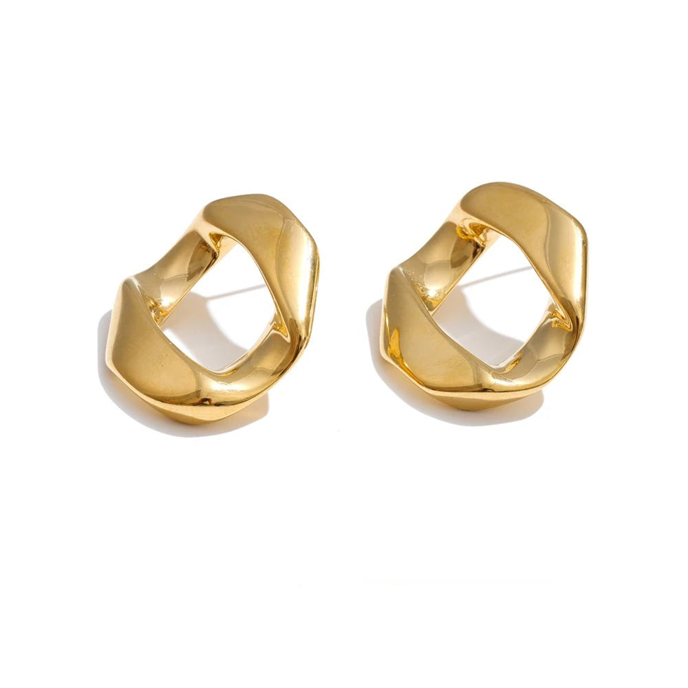 Gold-plated stainless steel earrings with a unique loop design.
