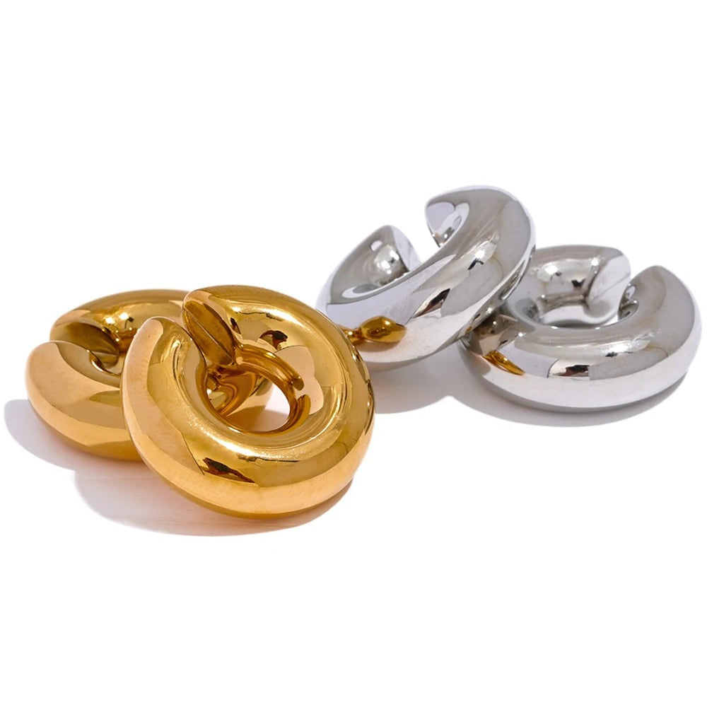 Earrings made of gold-plated stainless steel with a large loop design.