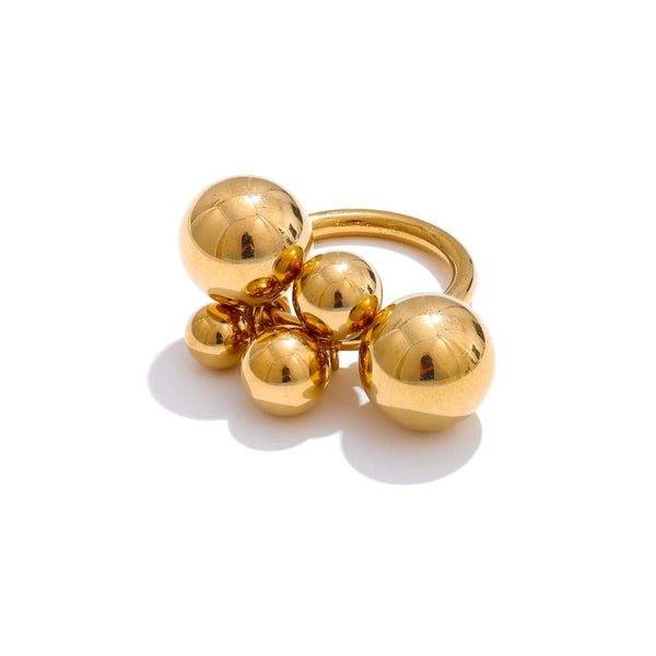 Gold-plated stainless steel ring with multiple spheres.