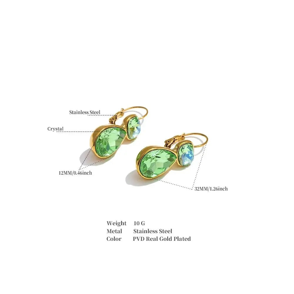 Crystal geometric earrings in gold-plated stainless steel with crystal.